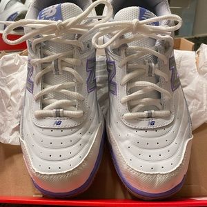 New Balance 806 tennis court shoes size 9B.
